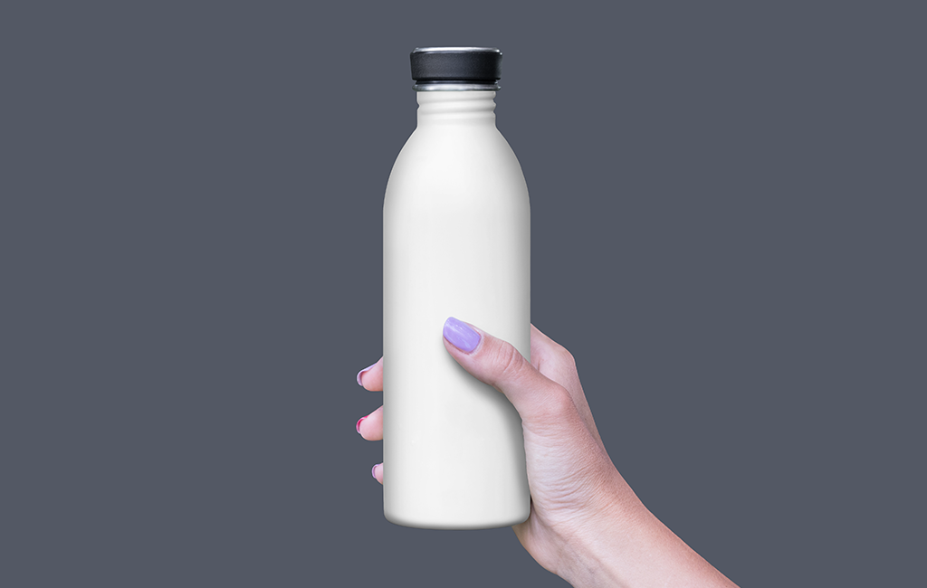 Download Plastic Bottle In Hand Mockups For Free